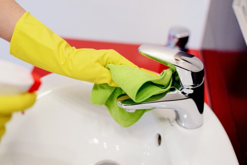 Technician treating a pet stain in a Kingston upon Thames home