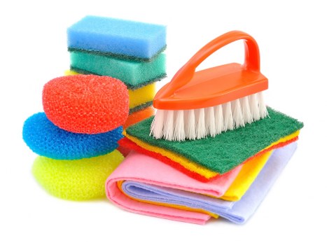 Professional carpet cleaner using safe floor protection procedures